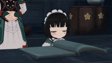 a girl in a maid outfit is laying on a book with her eyes closed