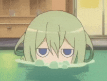 a green haired anime girl is swimming in a pool .