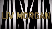 the name liv morgan is displayed in gold letters