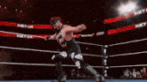 a wrestler in a ring with the word prime on the bottom