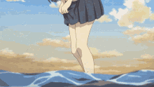 a girl in a skirt is standing on a wave