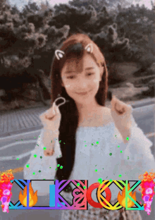 a girl with a cat ear on her head is surrounded by the letters xkck