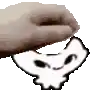 a hand is holding a cartoon cat 's head .