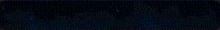 a blue light is shining on a black background with a few lines coming out of it .