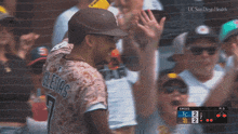 a baseball player wearing a jersey that says velenas on it