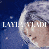 a close up of a person 's face with the name layla vladi