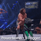 a wrestling match with the words powerbomb + v-trigger written on the bottom