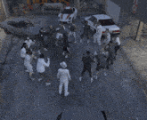 a group of people are standing in a circle on a street in front of a sign that says fuel