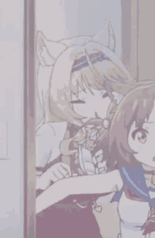 a couple of anime girls standing next to each other .