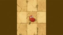 a red bean with a face is floating in the air .