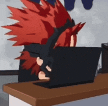 a cartoon character with red hair is sitting at a desk with a laptop .