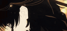 a close up of a person with long black hair