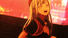 a girl with long blonde hair is wearing a red hat and a black cape