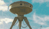 a picture of a tripod with the words tomslemen on the bottom right