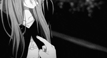 a black and white photo of a girl with long hair