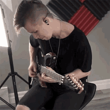 Strumming Cole Rolland GIF - Strumming Cole Rolland Playing Guitar GIFs