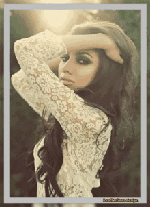 a picture of a woman in a white lace top
