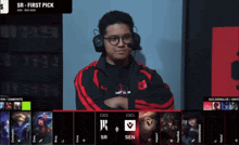 a man wearing headphones and a jacket that says sr on it