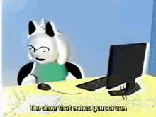 a cartoon character is sitting at a desk with a computer and a mouse and the words the show that makes you scream