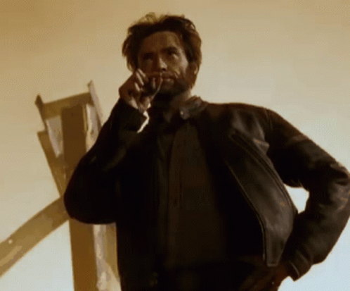 wolverine-what-surprised-fire-smoking.gif