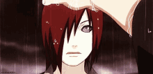 a girl with red hair and purple eyes is standing in the rain with a hand on her head