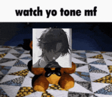 a teddy bear is sitting on a quilt with a picture of a man behind it that says " watch yo tone mf "