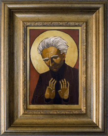 a framed painting of a man with his hands together