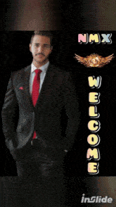 a man in a suit and red tie is standing in front of a sign that says welcome