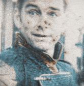 a close up of a man 's face with the word lawrity on the bottom right
