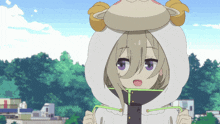 a girl with purple eyes is wearing a sheep hood