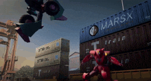 a robot is standing in front of a large marsx container