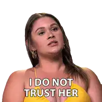 a woman in a yellow bikini has a sticker on her face that says i do not trust her