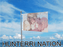 a flag that says hunterri nation with a picture of a monkey and a girl on it