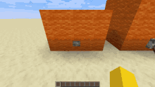 a screenshot of a video game with a hammer and a yellow block