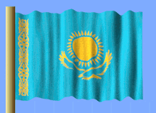 a blue and yellow flag with a sun and eagle on it