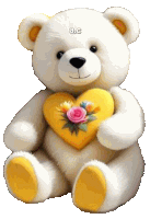 a white teddy bear is holding a yellow heart with flowers on it