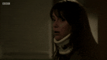 a woman with a collar around her neck is on bbc