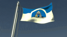 a blue and white flag with a large rock in the middle