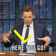 Seth Meyers Here You Go GIF - Seth Meyers Here You Go Letter L GIFs