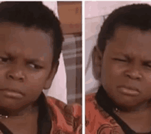 a young boy is making a funny face while sitting in a chair .