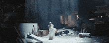 a man in a white suit is standing in a room