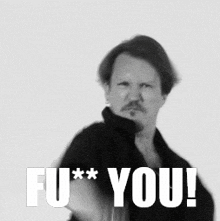 a black and white photo of a man with the words fu * you written on the bottom