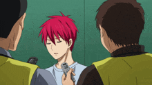 a man with red hair is being interviewed by a reporter