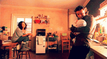 Mitchell And Annie And A Baby Mitchell GIF