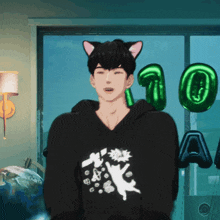 a man wearing a cat ear hoodie stands in front of green balloons that say 10