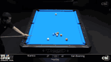 a pool table with a blue cloth that says diamond