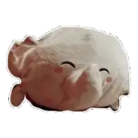 a stuffed animal that looks like an old woman with a smiley face