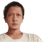 a close up of a man 's face with a white shirt on