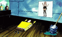 spongebob laying on the floor next to a mop and a picture of a girl