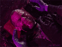 a man laying on a red pillow with dirtydelight written on the bottom of the image